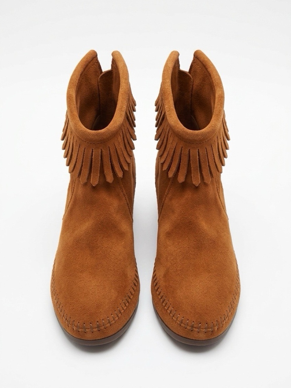 Minnetonka Suede Women’s Fringe Back Zip Ankle Boots in Brown